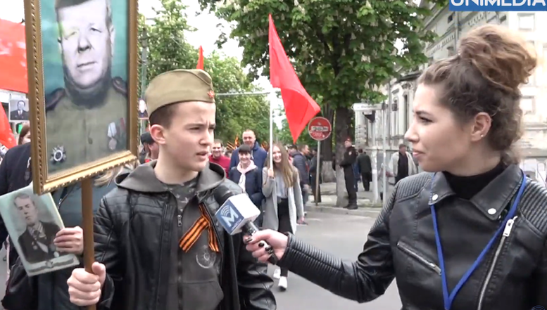 VIDEO. SOVIETIZAREA Basarabiei: socialiștii lui Dodon au adus ELEVI la marșul stalinisto-putinist de la Chișinău