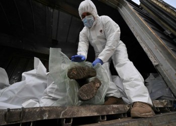 Zecile de mii de cadavre rămase neidentificate în Ucraina au determinat guvernul de la Kyiv să ceară ajutorul Japoniei pentru identificarea lor