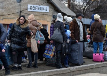 Donețk și Lugansk, război și propagandă cu ”refugiați” plătiți de Putin pentru ”exod”