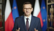 Criza ucraineană. Germania, luată la țintă de premierul Poloniei: "Ar trebui să ne uităm de pe margine cât Putin anexează Ucraina?"