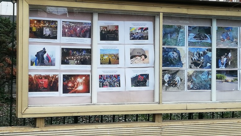 Propaganda infernală a kgb-iștilor lui Putin acționează, fără reținere, în inima Bucureștiului. Imagini macabre cu „crimele Ucrainei” din Donbas, expuse, pentru a putea fi văzute de cetățeni, pe panourile din fața Ambasada Rusiei