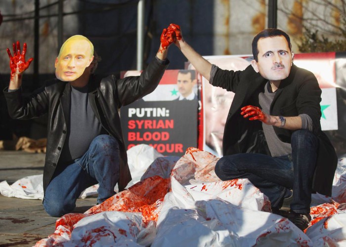 Șueta Măcelarilor! În timp ce omoară copii, cot la cot, în Siria, Putin și Bashar al-Assad s-au felicitat reciproc, la Moscova...